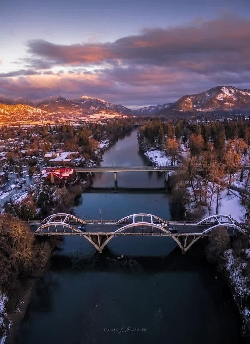 Aerial view of the Rogue River and Caveman Bridge at sunset in Grants Pass